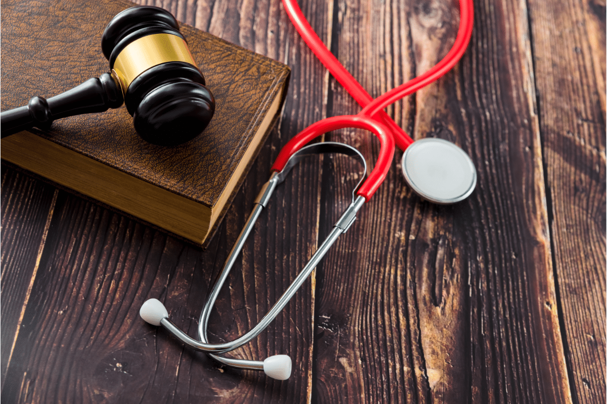 gavel, stethoscope and law book