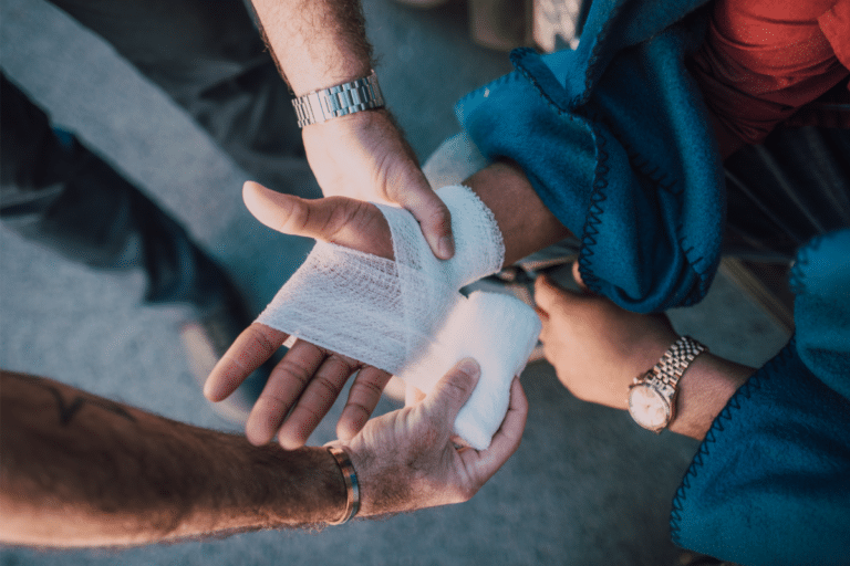 man having his hand bandage