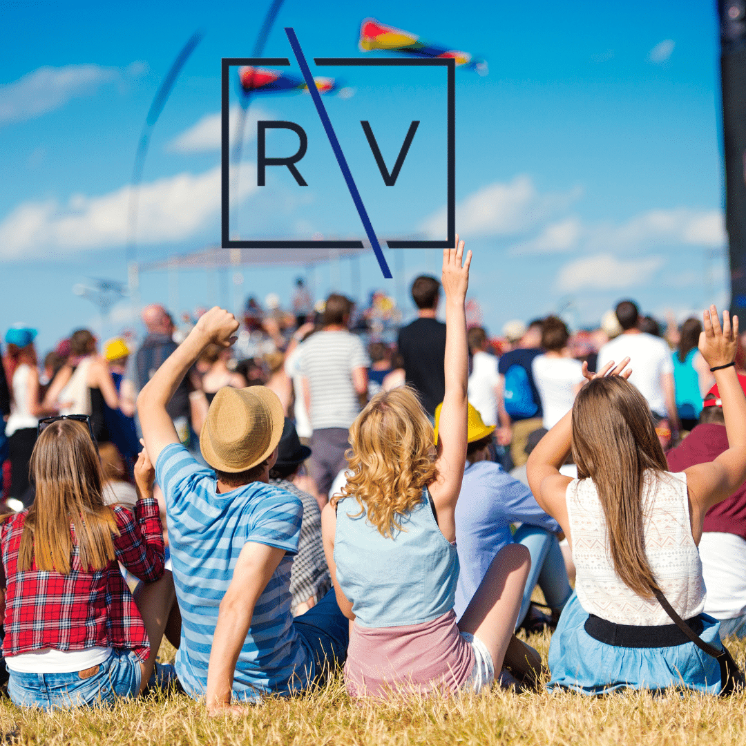 People at a music festival with Richmond Vona logo in the sky