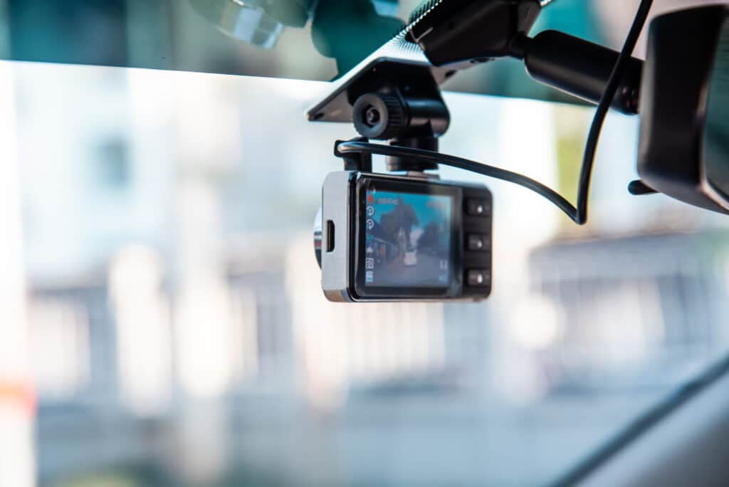 Car video camera attached to the windshield to record driving and prevent danger from driving